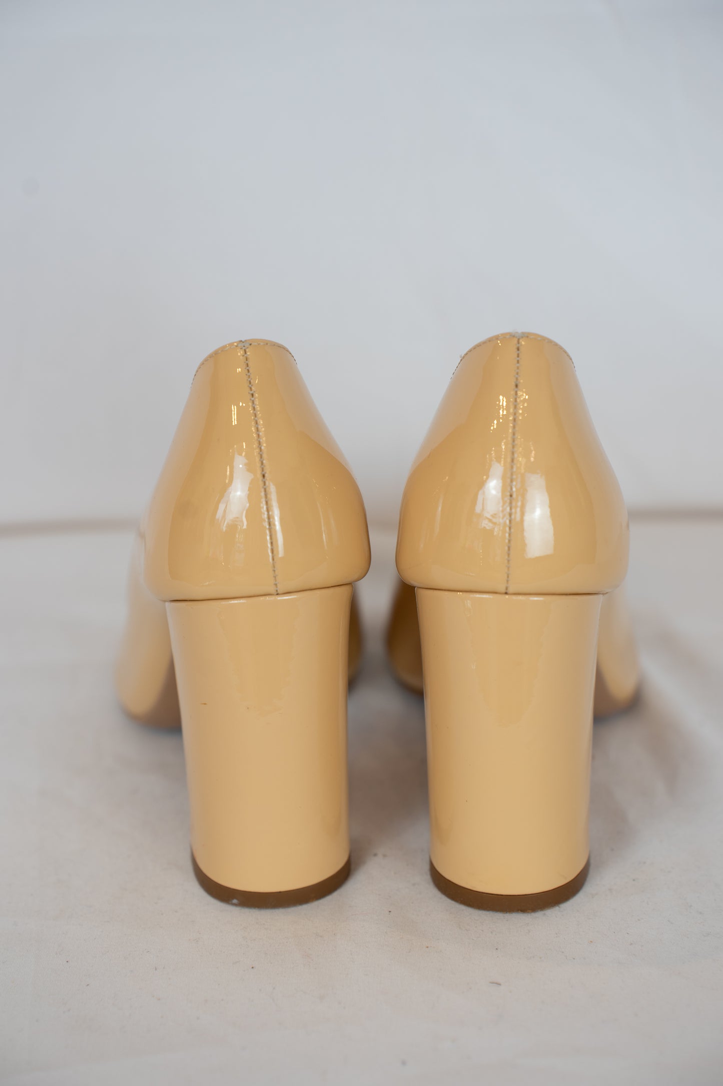 Ferragamo Nude Round Toe Pumps w/ Toe Bow