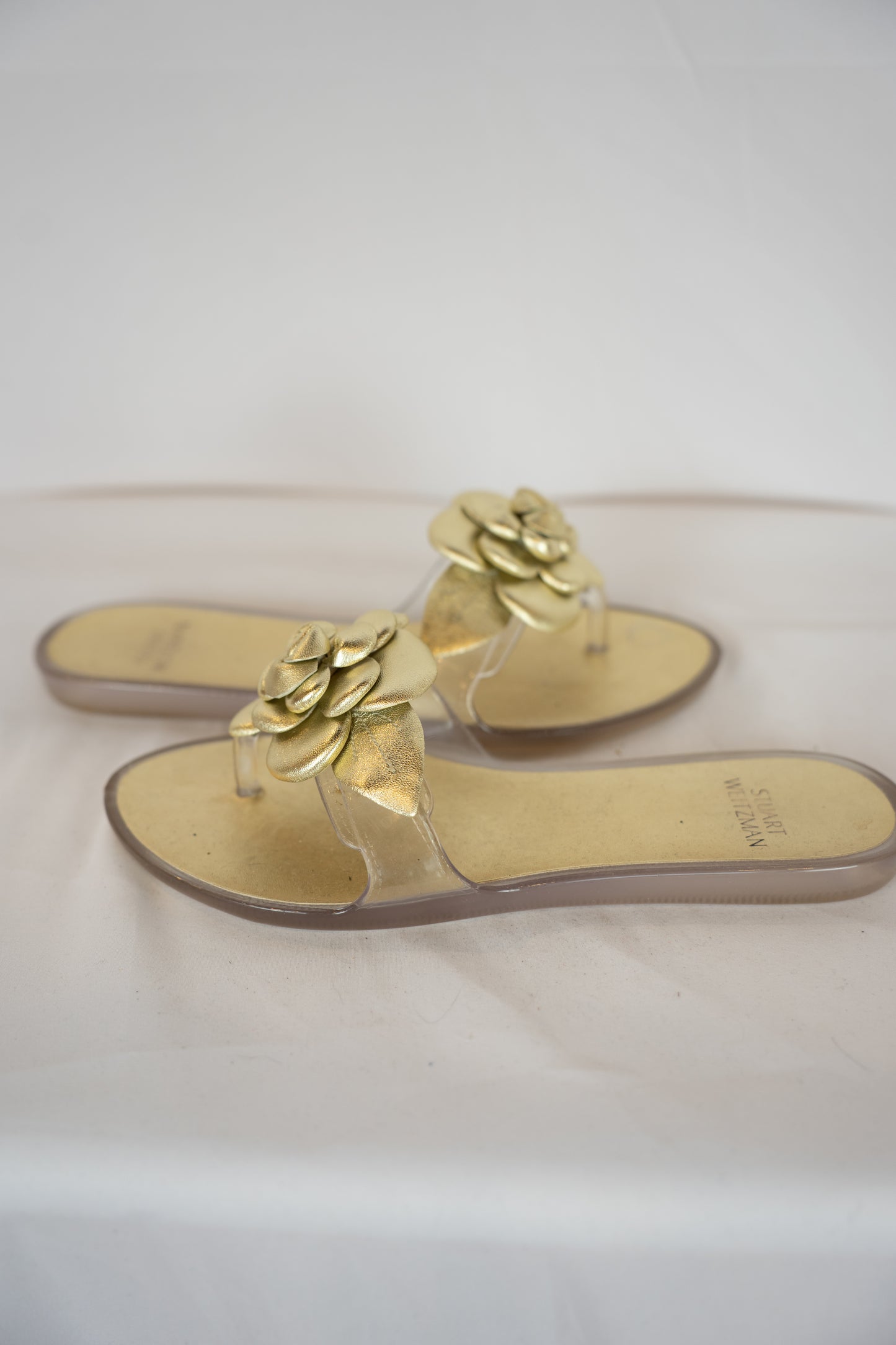 Stuart Weitzman Gold Jelly Flip Flop w/ Flower Detail