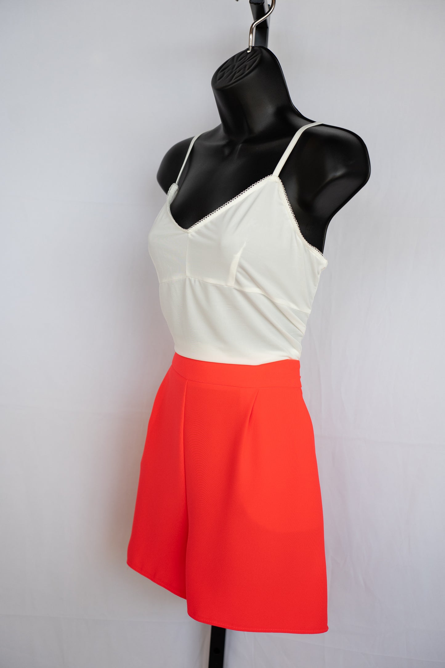 Simkhai Bright Orange Cuffed Mini Shorts w/ Pleating Details