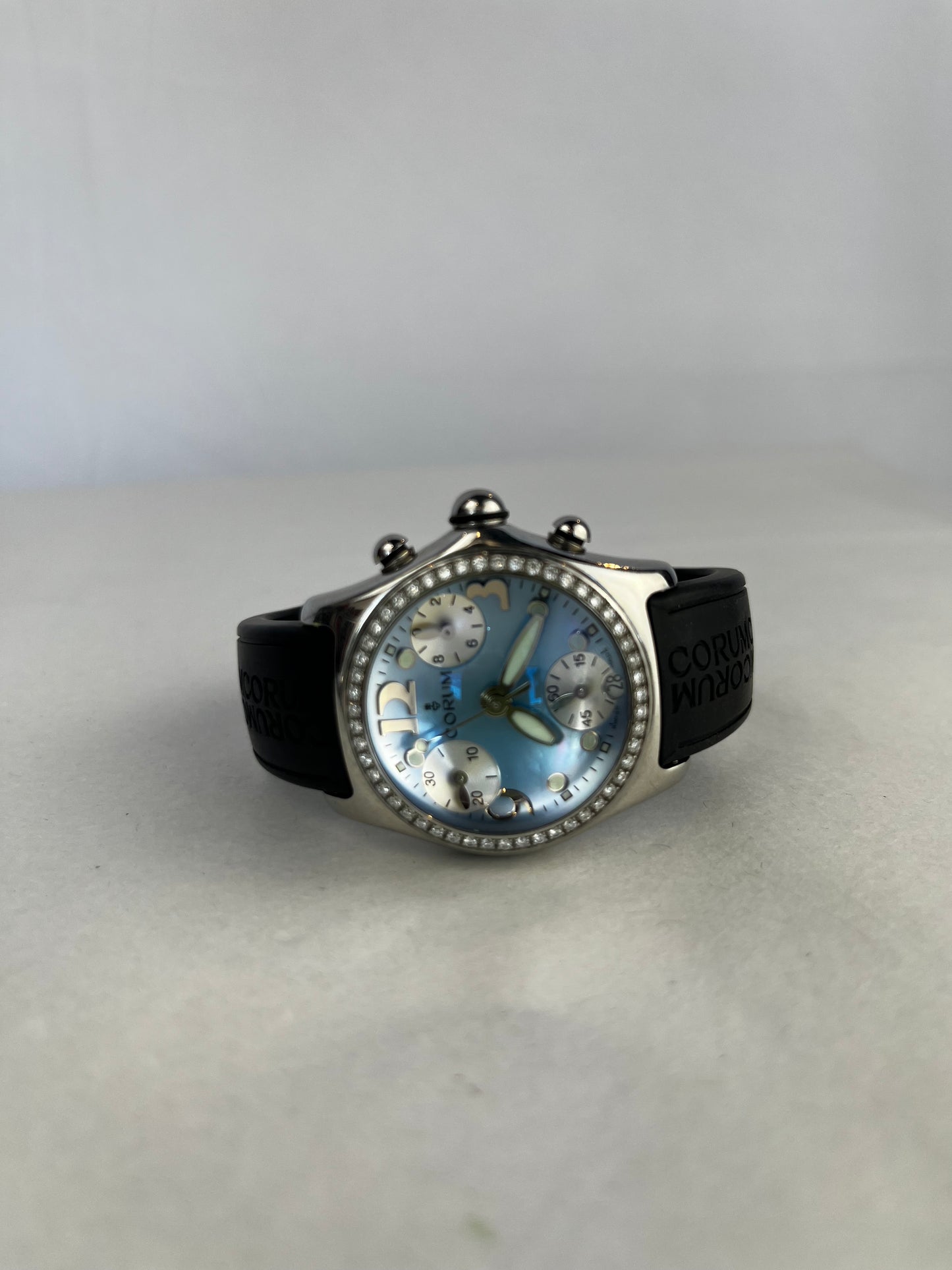 Corum Silver Toned Stainless Steel Blue Face Black Band Diamond Bezel Bubble Watch