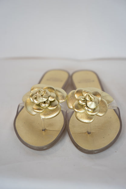 Stuart Weitzman Gold Jelly Flip Flop w/ Flower Detail
