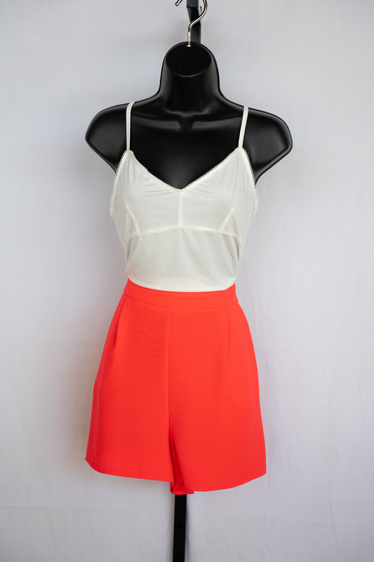 Simkhai Bright Orange Cuffed Mini Shorts w/ Pleating Details