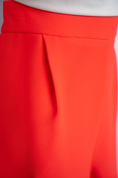 Simkhai Bright Orange Cuffed Mini Shorts w/ Pleating Details
