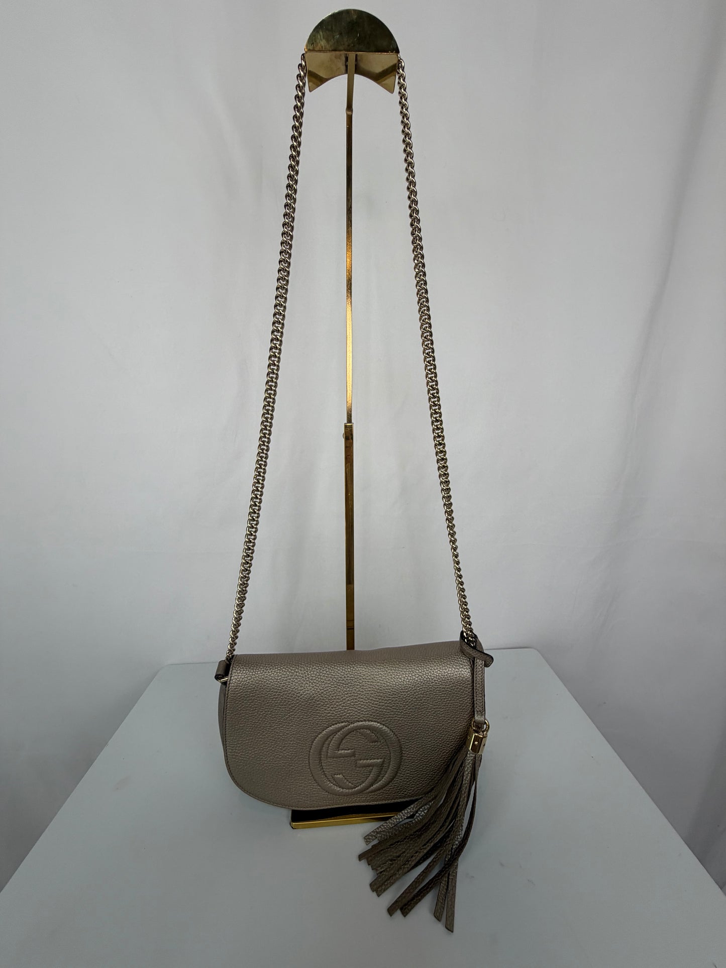 Gucci Metallic Leather Soho Gold Chain Flap Bag w Embossed Interlocking GG Logo & Tassel