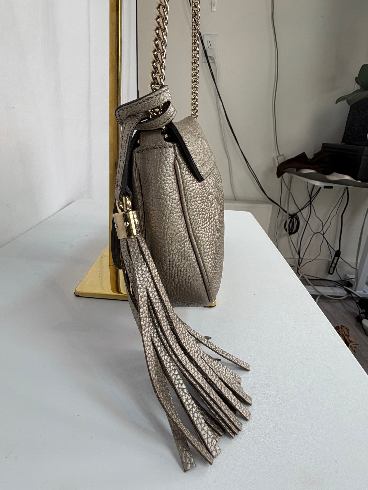 Gucci Metallic Leather Soho Gold Chain Flap Bag w Embossed Interlocking GG Logo & Tassel