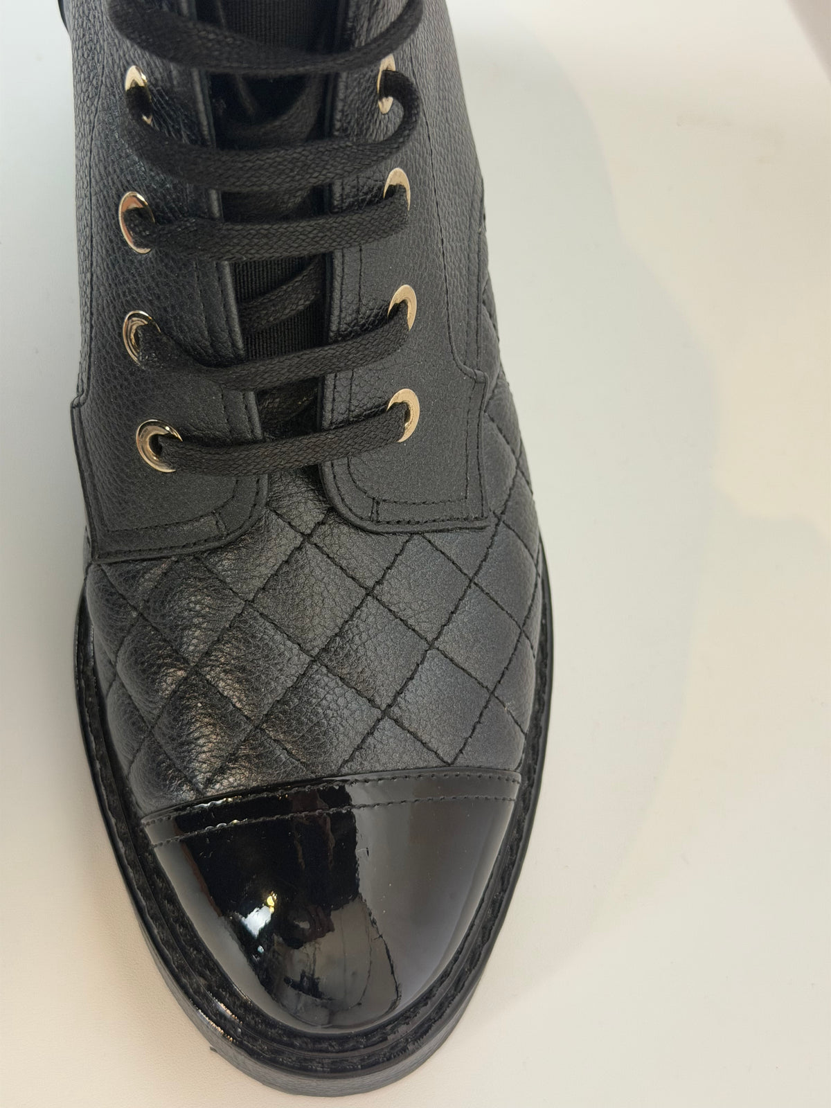Chanel Black Quilted Leather Pearl Accent Patent Toe Cap Combat Boots