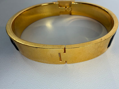 Hermes Clic Cadenas Bracelet in Black  Enamel & Yellow Plated Metal
