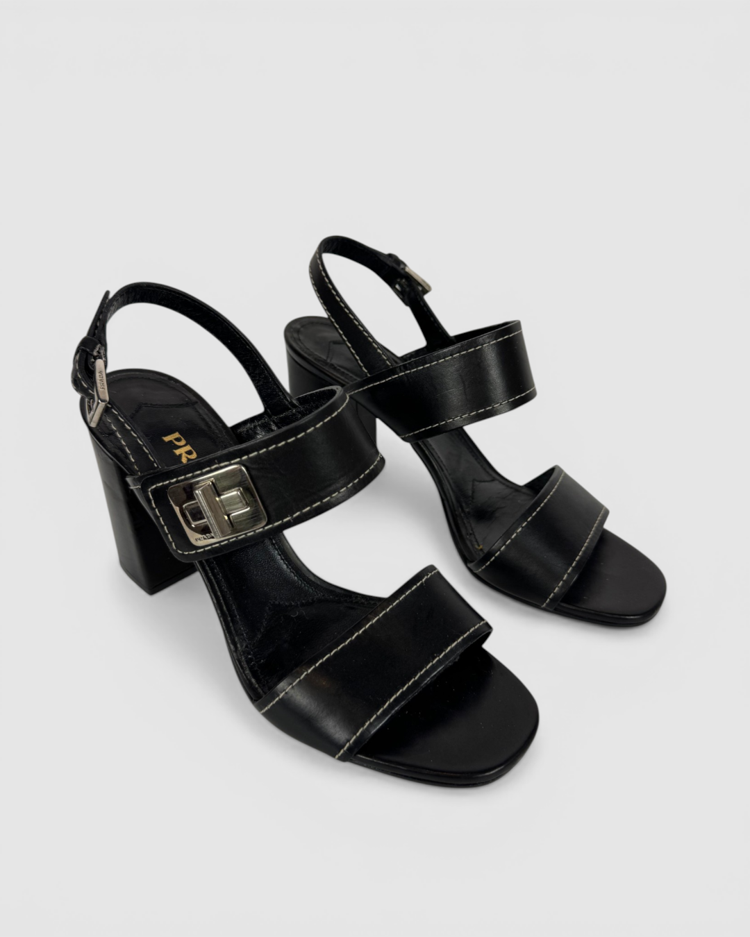 HAS DUSTBAG - Prada Black Leather Turnlock Block Heeled Sandals